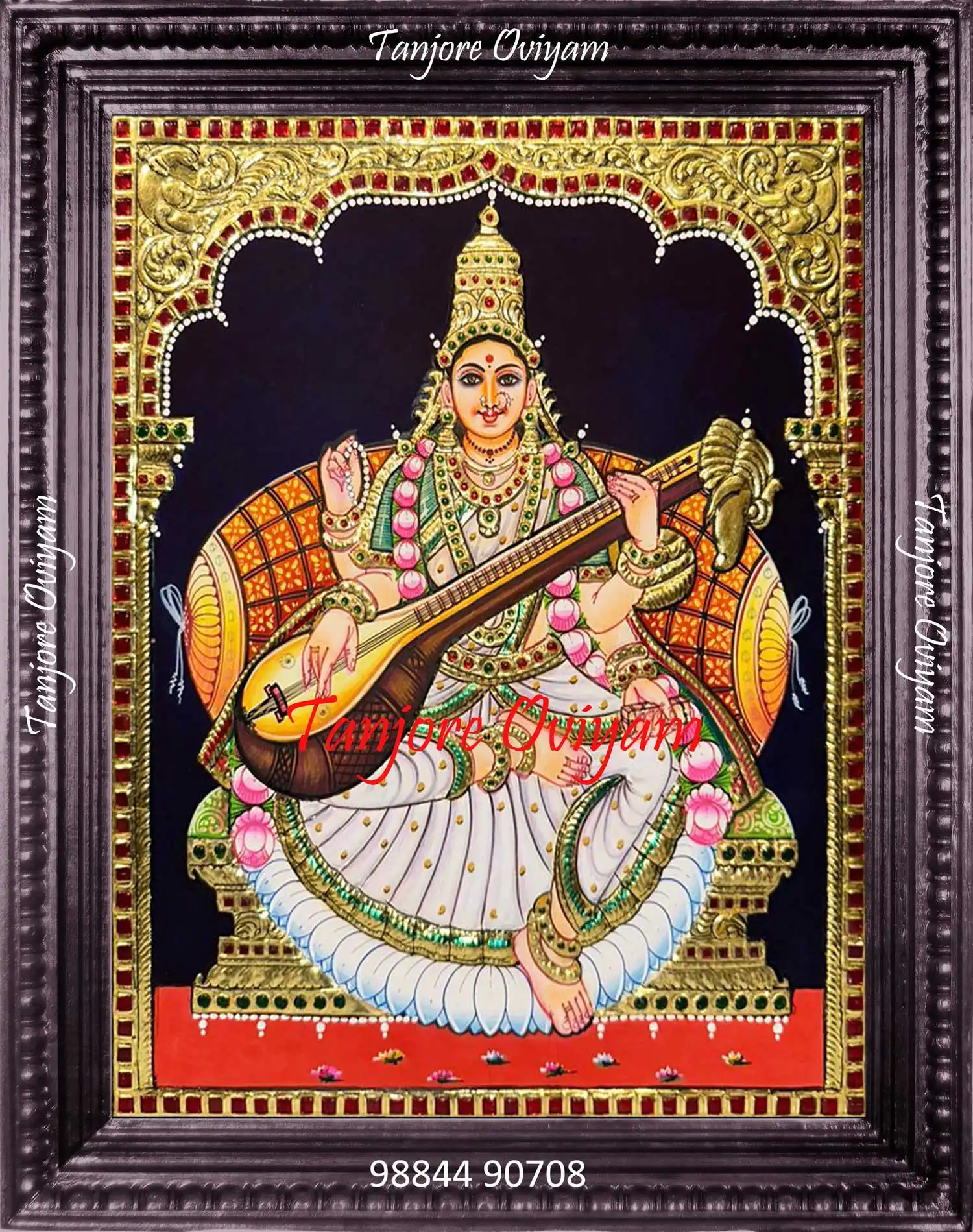Traditional Saraswathi Tanjore painting with veena and gold foil detailing